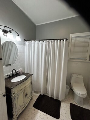 Jetted bath, hair dryer, towels, soap