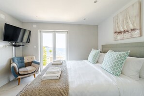 4 bedrooms, iron/ironing board, travel cot, WiFi