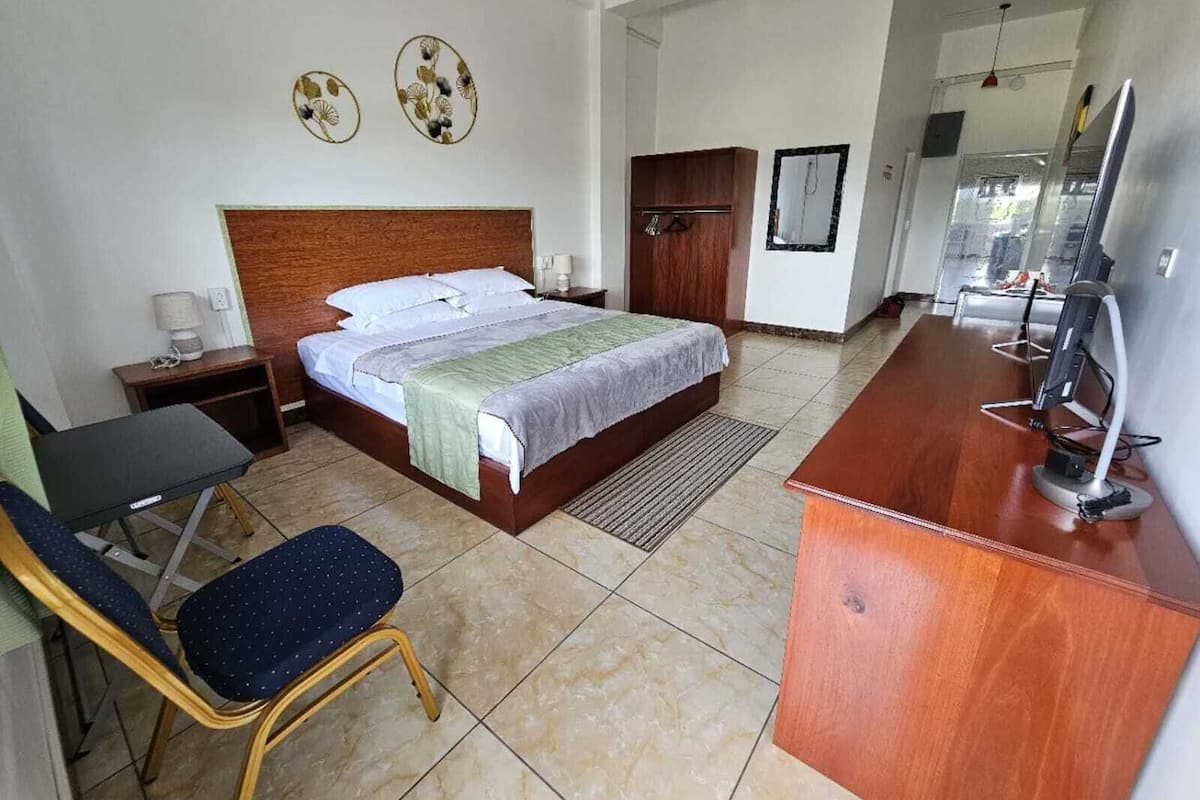 Comfort Single Room, City View | In-room safe, desk, laptop workspace, iron/ironing board