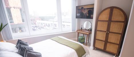 1 slaapkamer, een strijkplank/strijkijzer, wifi, beddengoed