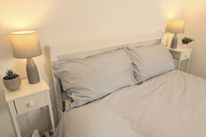 2 dormitorios, tabla de planchar con plancha, wifi y ropa de cama