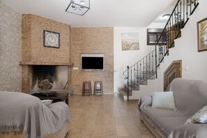 Televisión, chimenea