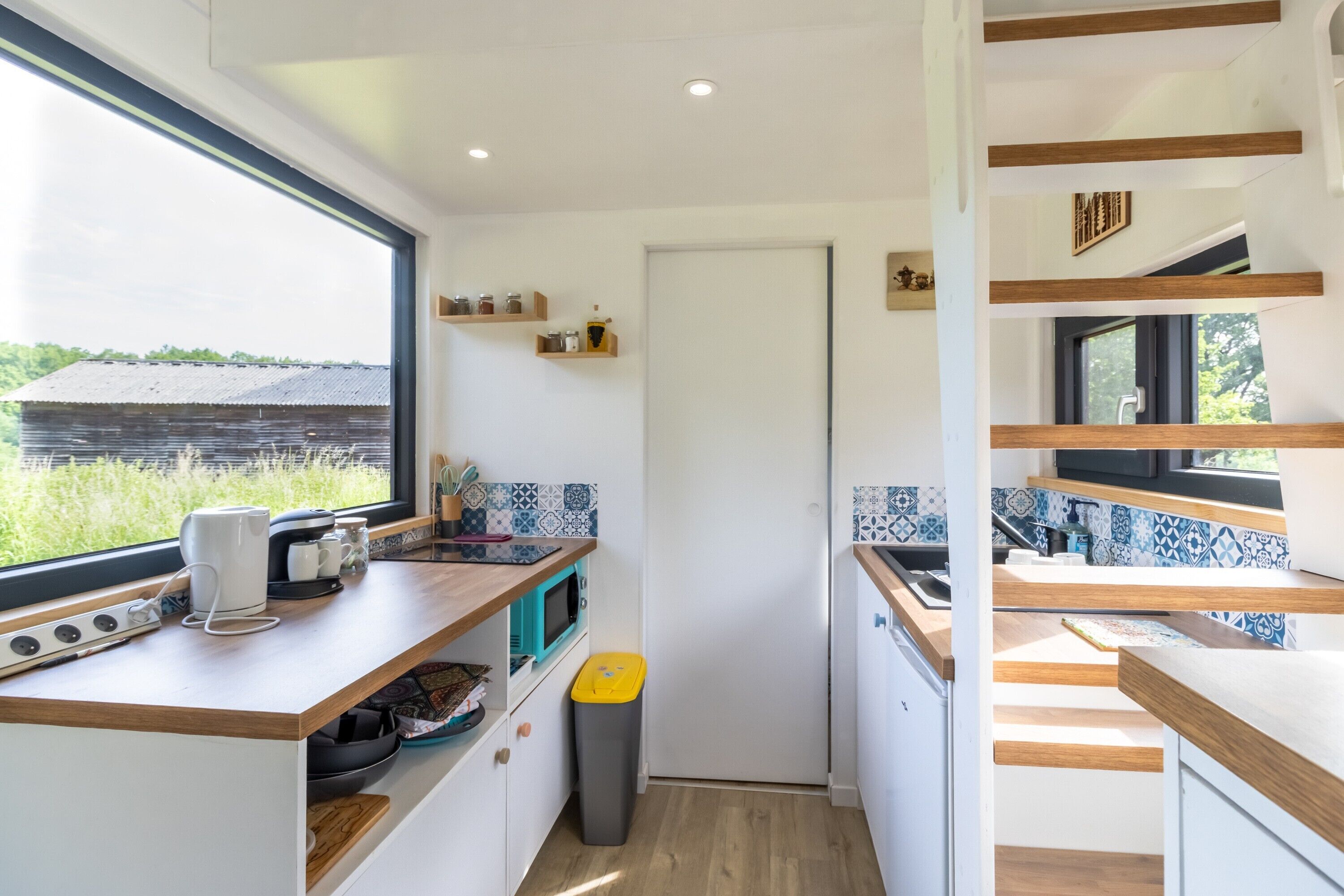 Fridge, microwave, stovetop, coffee/tea maker