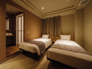 Economy Twin Room | In-room safe, blackout drapes, iron/ironing board, free WiFi
