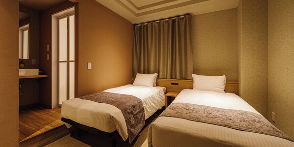 Economy Twin Room | In-room safe, blackout drapes, iron/ironing board, free WiFi