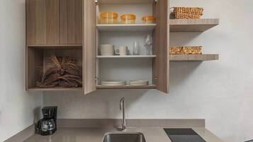 Microwave, stovetop, coffee/tea maker, toaster