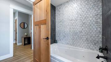 Shower, jetted bath, hair dryer
