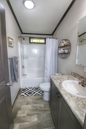 Shower, hair dryer, towels, soap - The Hein Cottage-Beautiful 2 bedroom hideaway in the heart of DC (Sturgeon Bay)