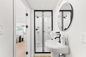 Shower, hair dryer, towels