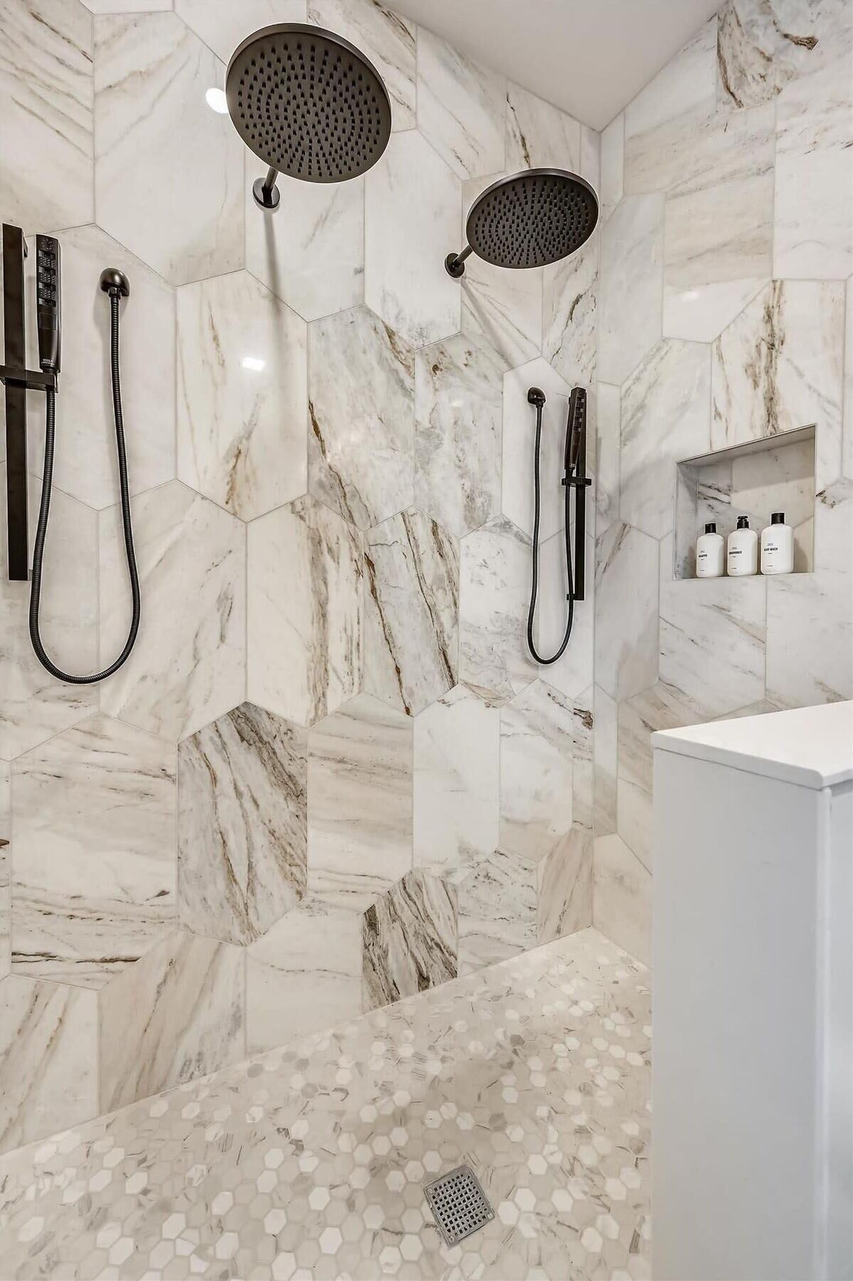 Shower, hair dryer, towels, shampoo