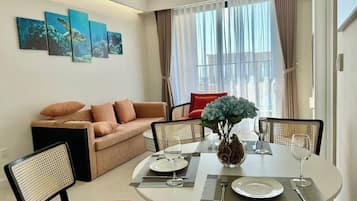 Family Apartment, 2 Bedrooms, City View | Living area | 45-inch TV with premium channels