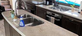 Riverfront 5th Wheel Retreat –Peaceful Fishing Getaway-Private Riverfront Access