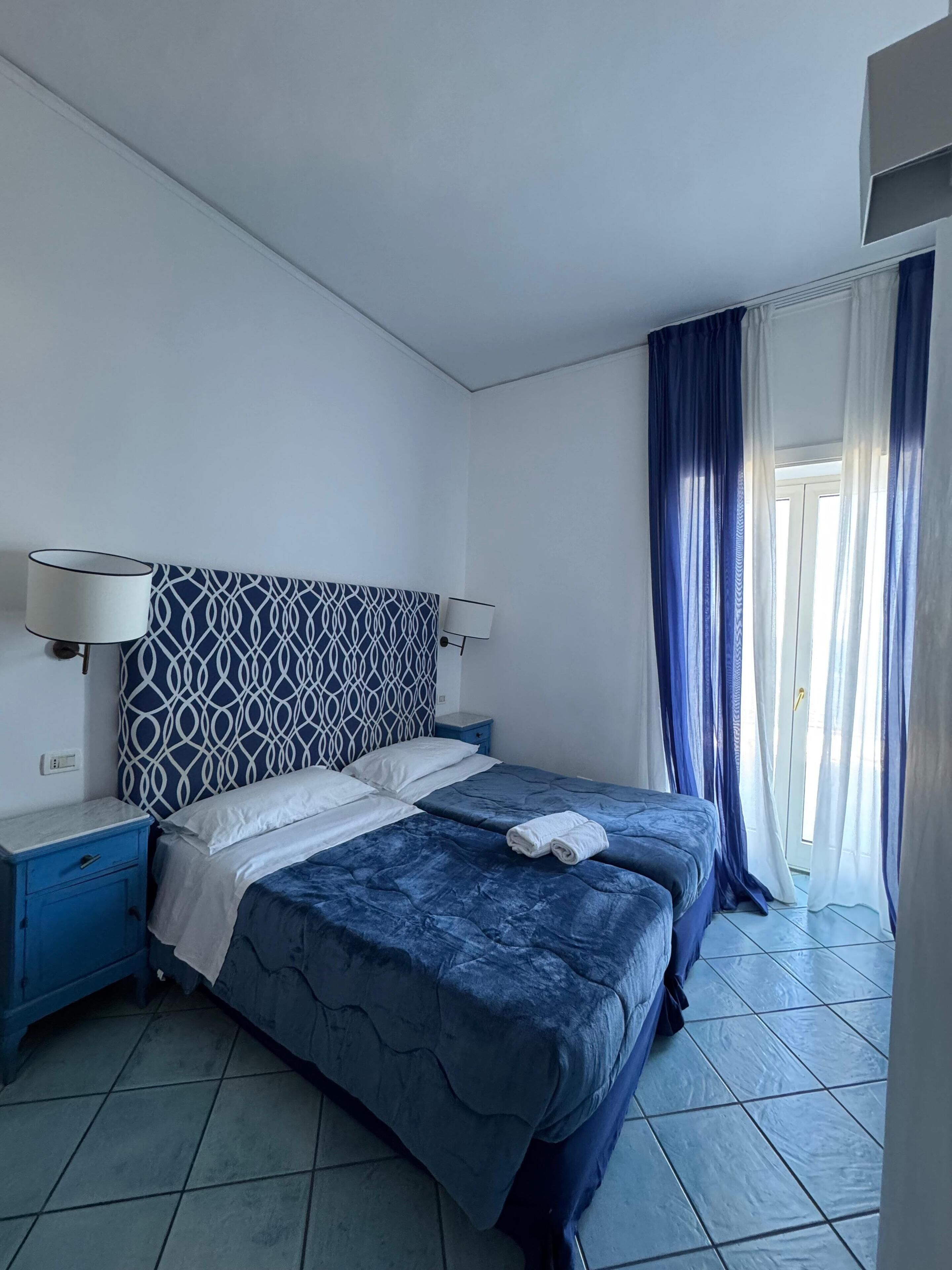 Deluxe Double or Twin Room, Balcony, Sea View | Down comforters, in-room safe, desk, iron/ironing board