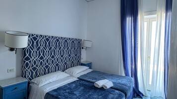 Deluxe Double or Twin Room, Balcony, Sea View | Down comforters, in-room safe, desk, iron/ironing board