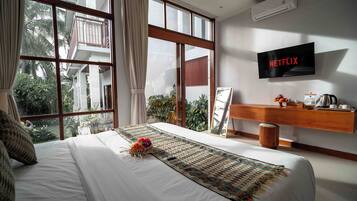 Deluxe Double Room, Pool View | Television