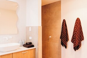 Shower, hair dryer, towels, soap