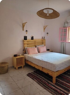 1 غرفة نوم ومكواة/لوح كي وواي فاي وملاءات أسرّة