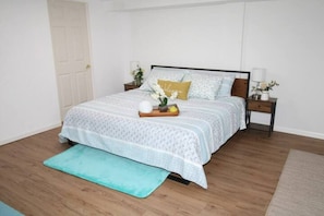 1 bedroom, desk, iron/ironing board, travel crib