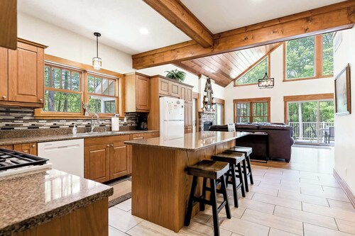 Impressive Dual Woods and Lake Homes That Sleep 32