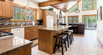 Impressive Dual Woods and Lake Homes That Sleep 32