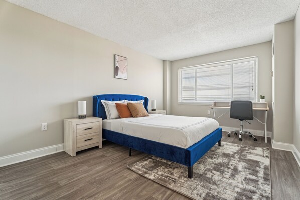 2 bedrooms, desk, iron/ironing board, travel crib