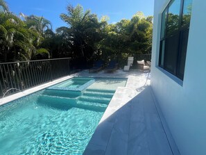 Outdoor pool, a heated pool - Modern 4-bedroom house with pool/spa in Naples and minutes from Marco Island. (Naples)