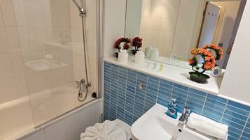 Shower, hair dryer, toilet paper