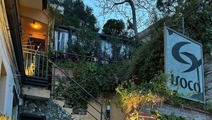 A stone staircase leading to a gated entrance with a sign reading "Soco". - Isoco Terrace (Taormina)