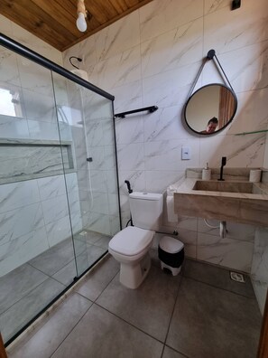 Shower, towels, soap, toilet paper