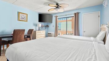 Tabla de planchar con plancha, wifi y ropa de cama