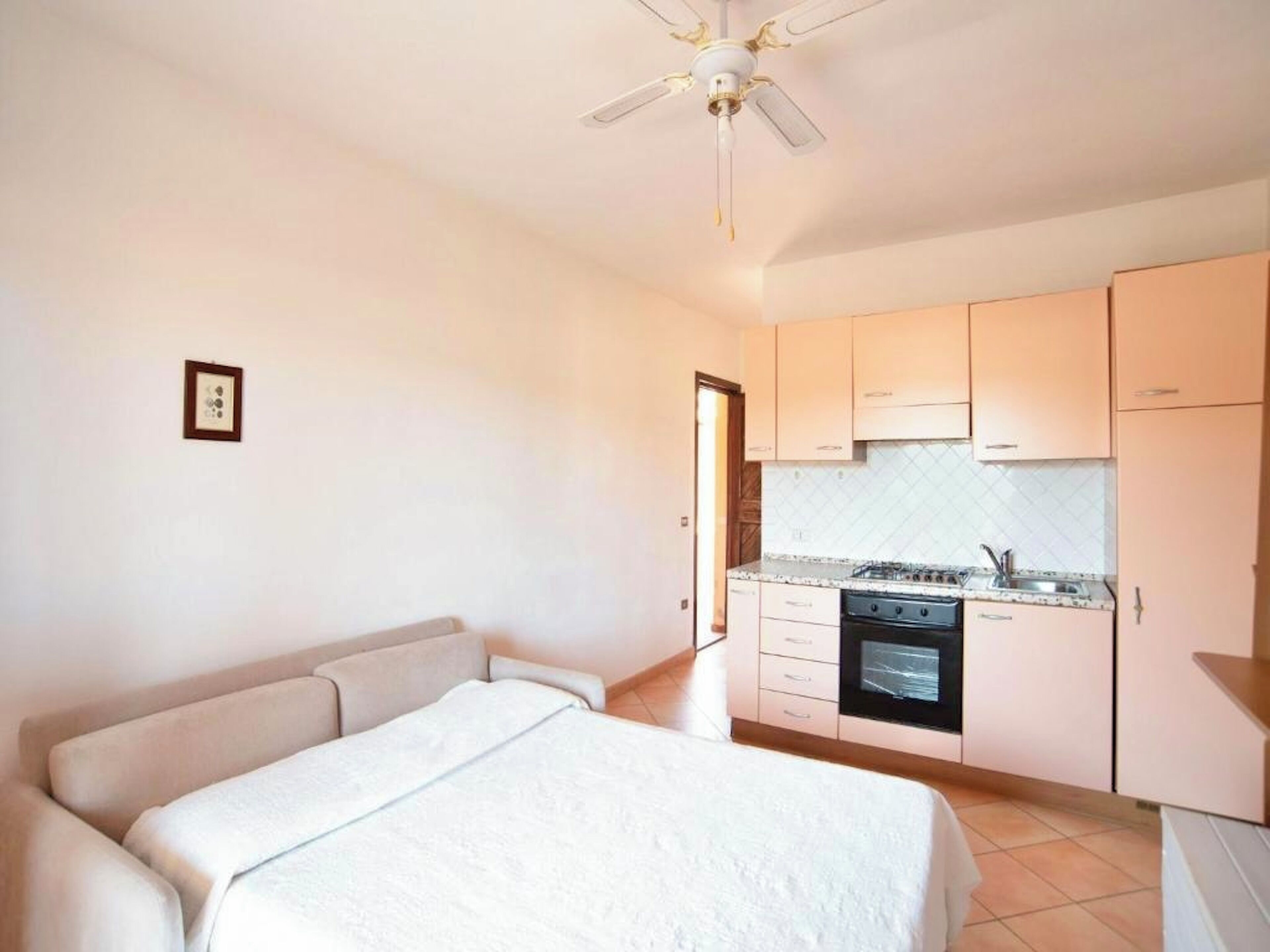 Studio | Living area | 24-inch flat-screen TV with satellite channels