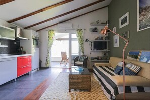 Appartement | Aire de séjour | Téléviseur