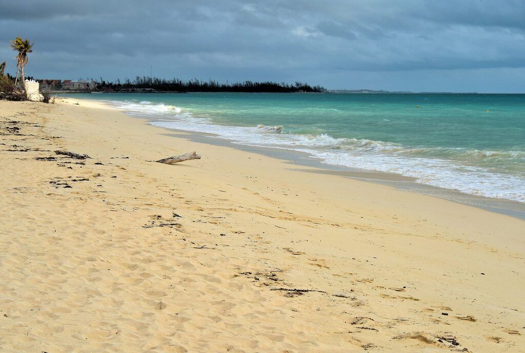 On the beach, sun loungers, beach towels