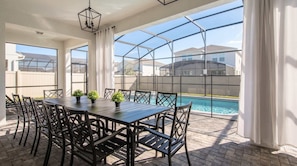 Outdoor dining - 10BR Game & Theme Villa w/ Pool, Spa + Near Disney (Davenport)