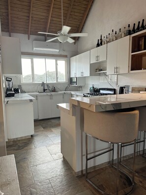 Fridge, microwave, oven, stovetop - Three bedroom house on the east coast amazing views (St Andrew)
