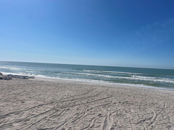 On the beach, sun loungers