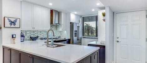 Coffee/tea maker, fridge, microwave, oven