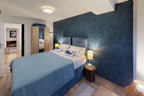 3 habitaciones, tabla de planchar con plancha, wifi y ropa de cama 