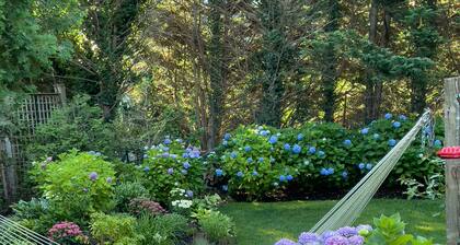 Beautiful 4 bedroom house with tranquil gardens close to bay beaches.