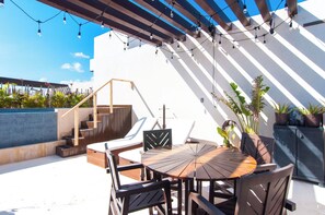Outdoor dining - Charming 3-bdrm condo w/WiFi, Fitness Room & Private Rooftop Plunge Pool! (Akumal)