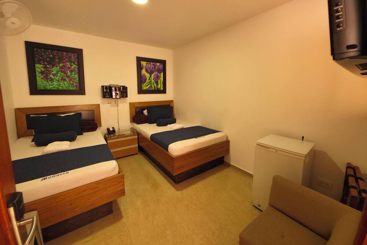 Laptop workspace, free WiFi, individually furnished, bed sheets