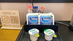 A tray with Tetley tea bags and Lakeland whole milk and semi-skimmed milk cartons. - HNFC Stays - Business En-Suit (Tyne and Wear)