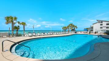 Outdoor pool, pool umbrellas, sun loungers