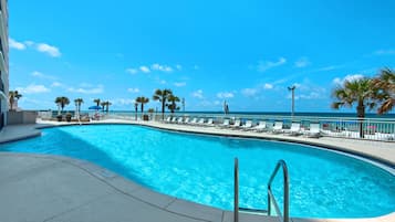 Outdoor pool, pool umbrellas, sun loungers