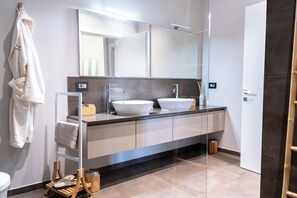 Shower, jetted bath, hair dryer, bidet