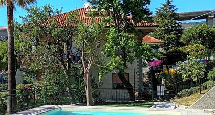 New two-room apartment with residential pool, large terrace and exclusive parking space
