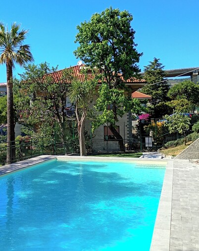 New two-room apartment with residential pool, large terrace and exclusive parking space