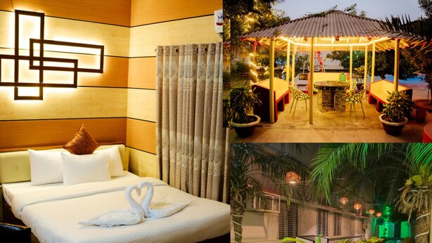 Habitación de hotel con cama, lámpara de pared y vista al exterior.