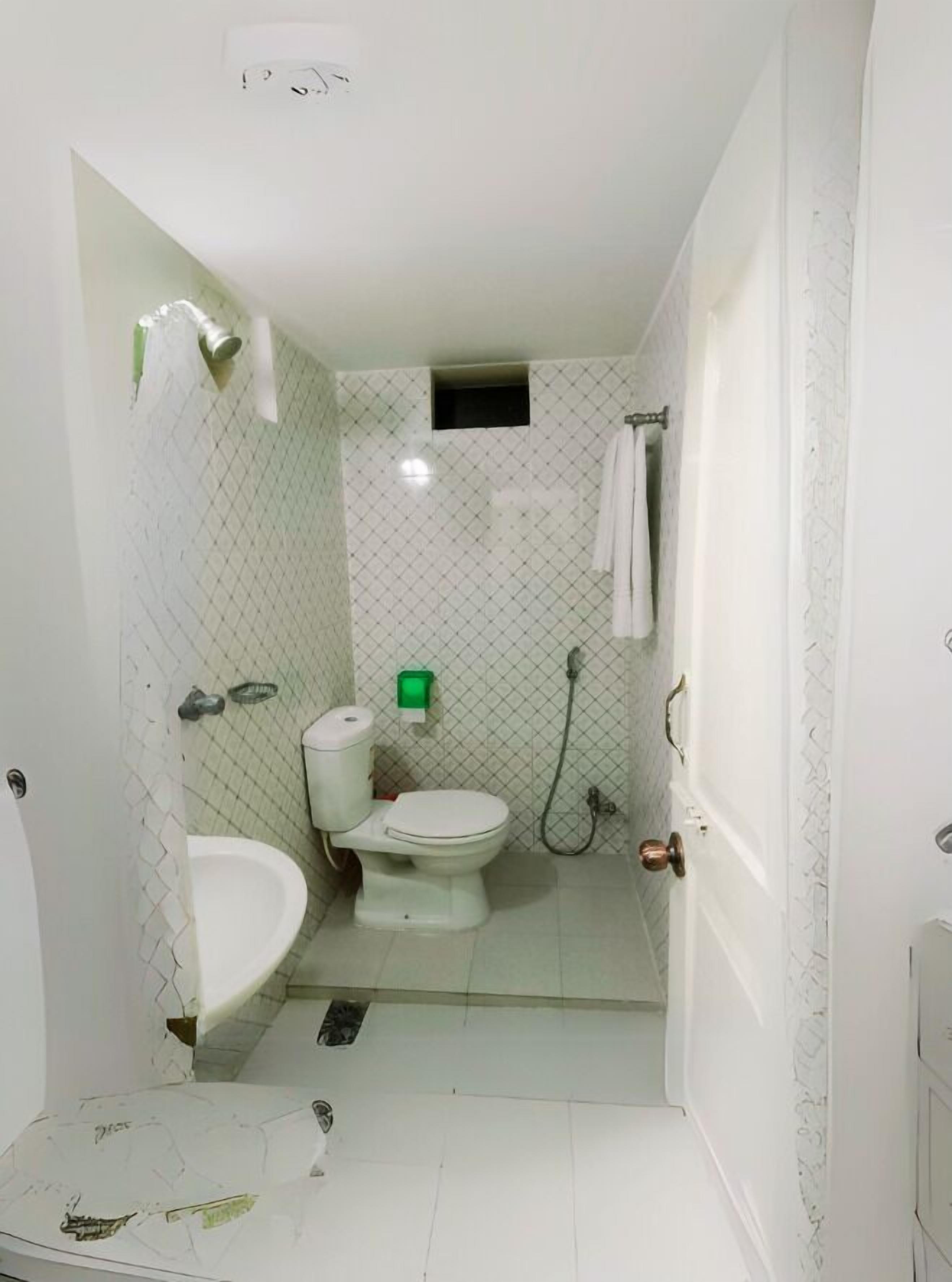 Chambre Double Deluxe, vue jardin | Salle de bain