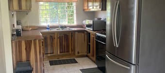 Fruitful paradise 
Charming house with WiFi 
welcoming you to enjoy and relax